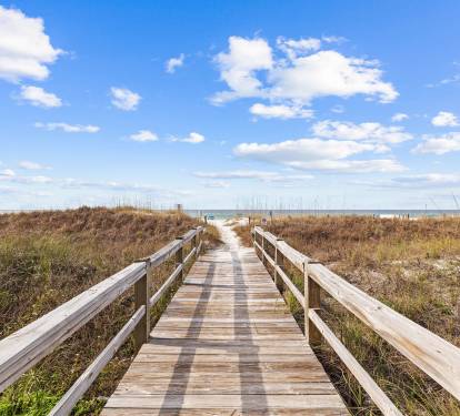 Take a Stroll to the Beach - Just Steps Away!