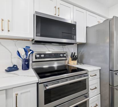 Fully Equipped Kitchen Offering Stainless Steel Appliances