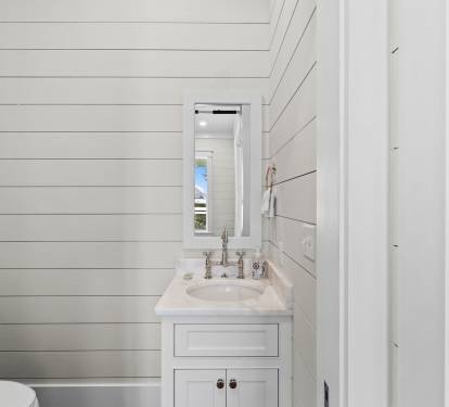 Convenient First-Floor Half Bath off Laundry Room