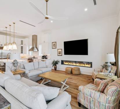 Cozy Up in the Spacious Living Area - Offering an Electric Fireplace