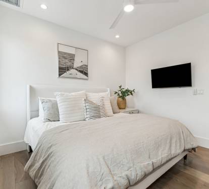 Primary King Suite - Equipped with a Flat-Screen TV