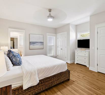 Offering a Flat-Screen TV & Balcony Access Off the En-Suite