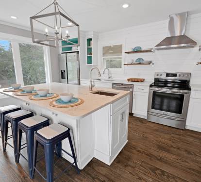 Updated Kitchen with Bar Stools for Four