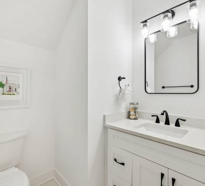 1st Floor Powder Room - Conveniently Located off the Kitchen
