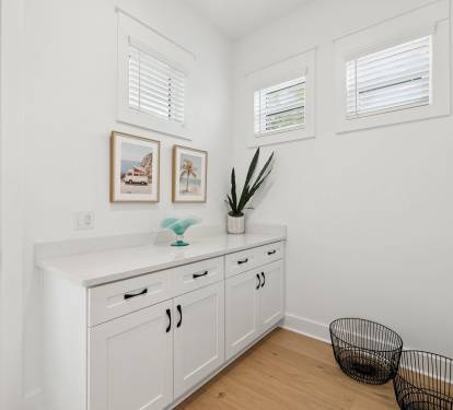 Ample Storage in the Mud Room - Conveniently Located Off the Patio