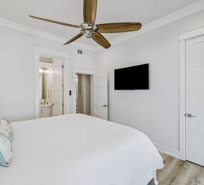 King Guest Suite - Balcony Access + Flat-Screen TV