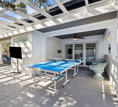 Enjoy a Game of Ping Pong or a Movie on the Flat-Screen TV