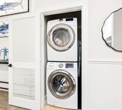 Stack Washer & Dryer Located in the Laundry Area