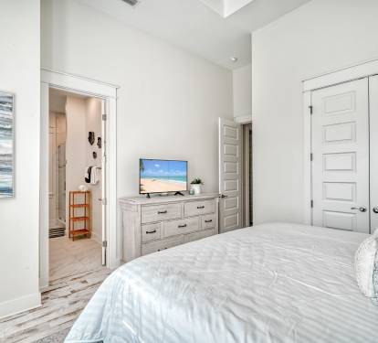 Primary King Suite - Equipped with a Flat-Screen TV