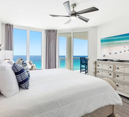 Wake to stunning ocean views from your luxurious bedroom, where floor-to-ceiling windows frame endless turquoise waters and pristine beaches.