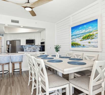 Your bright dining space flows seamlessly into the modern kitchen, perfect for morning coffee or family meals together.