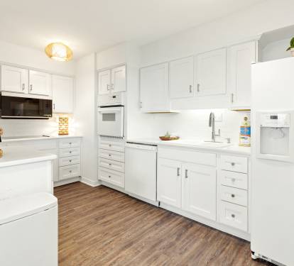 Your bright, spacious kitchen awaits with modern appliances and ample counter space for preparing meals together.