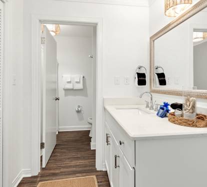 Freshen up in your bright bathroom with vanity counter space, thoughtful amenities, and a tub-shower combo for unwinding.