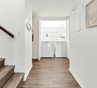 Your own dedicated laundry space keeps your vacation wardrobe fresh with full-sized washer and dryer tucked away in this bright, clean alcove.