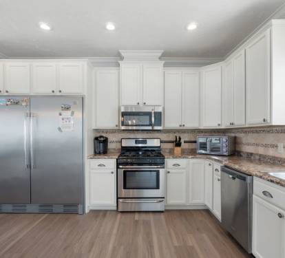 Kitchen With Massive Fridge/Freezer