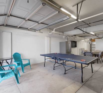 Garage W/ Extra Fridge, Smart Tv, & Ping Pong Table