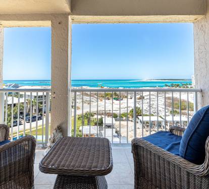 Step onto your private balcony and sink into wicker seating while gazing at stunning turquoise waters and pristine beach views.