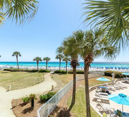 Stunning beachfront paradise with pristine white sand and crystal-clear turquoise waters just steps from your door.