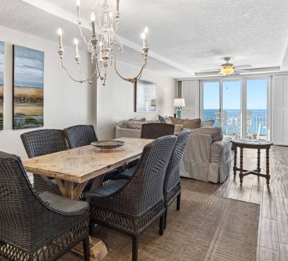 Gather for memorable meals in this elegant dining space, where ocean views frame every conversation through floor-to-ceiling windows.