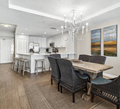 You'll love gathering in this elegant open-plan space where the kitchen island flows seamlessly into your dining area, perfect for shared meals.