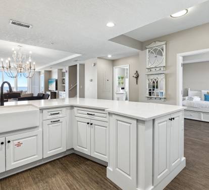 Your spacious kitchen flows into the living areas, perfect for preparing meals while staying connected with your travel companions.