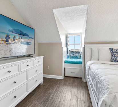 Drift off to sleep in your cozy bedroom, complete with comfortable bedding and entertainment for peaceful evenings.