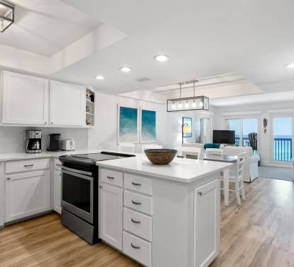 Your spacious kitchen flows seamlessly into the living area, where you'll love cooking with ocean views through the large windows.