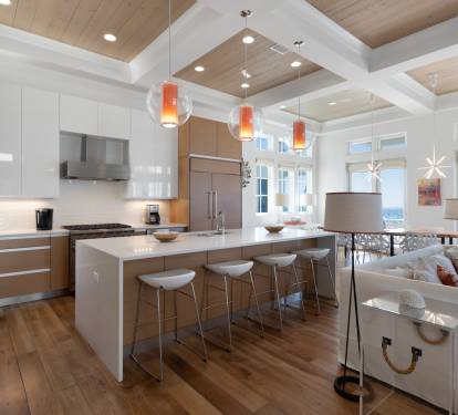 Unwind in this stunning open-concept space where modern elegance meets comfort. Your gourmet kitchen flows into cozy seating with breathtaking gulf views.