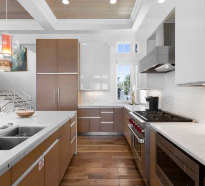Your fully-equipped modern kitchen invites culinary adventures with sleek appliances and pristine countertops perfect for preparing memorable meals.