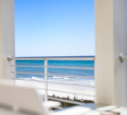 Wake up to endless gulf views from your private balcony, where gentle waves and pristine beaches create the perfect morning backdrop.