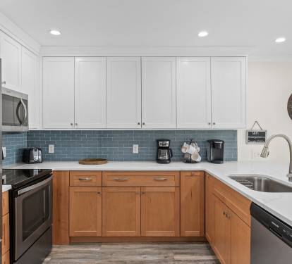 Your fully equipped kitchen awaits with modern appliances, ample counter space, and everything you need to create delicious meals during your stay.
