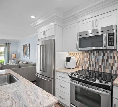 Open layout connects to a cozy, stylish living area.