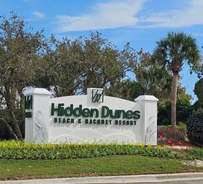 Welcome to Hidden Dunes, a gated beachside resort known for its lush grounds, tennis courts, and charm.