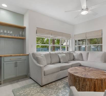 Cozy up in this stylish corner with plush seating, natural light, and a relaxed coastal atmosphere.