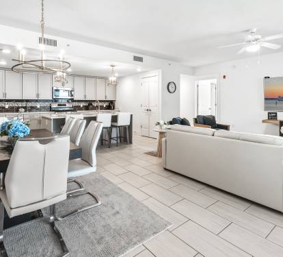 Step into your bright, modern retreat where sleek finishes and open living create the perfect backdrop for memorable evenings together.