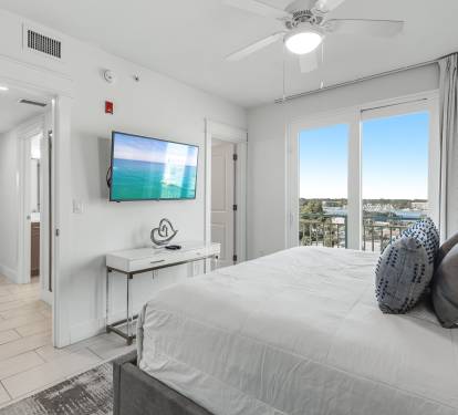 Wake up to stunning waterfront views from your comfortable king bed, with modern amenities and a peaceful retreat atmosphere.