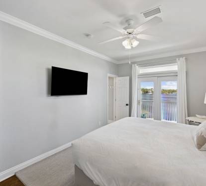 King Guest Suite - Balcony Access + Flat-Screen TV