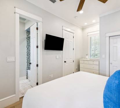 King Guest Suite - Balcony Access + Flat-Screen TV
