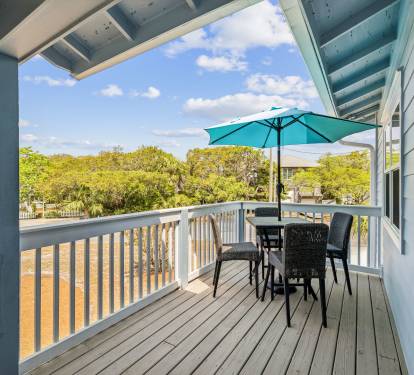 Enjoy Covered Seating for 4 on the Front Porch