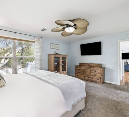 Primary King Suite - Equipped with a Flat-Screen TV