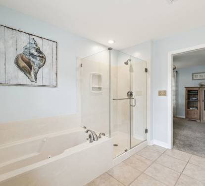 Primary King En-Suite - Soaking Tub + Walk-In Shower