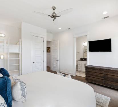 King Guest Suite - Balcony Access, Twin Bunk & Flat-Screen TV