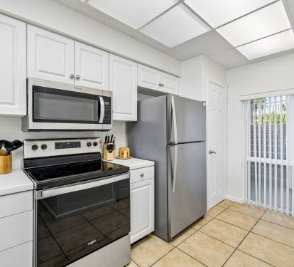 Fully Equipped Kitchen Offering Stainless Steel Appliances