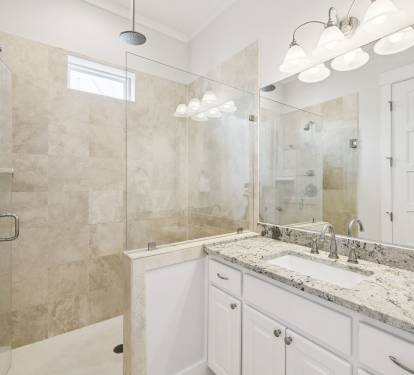 Primary King En-Suite - Single Vanity + Walk-In Shower