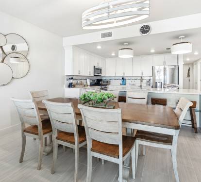 Gather around this stunning dining table where your group can share meals in this bright, modern space with a fully equipped kitchen.