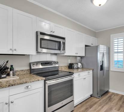 Natural light and modern touches make cooking a pleasure in this kitchen.
