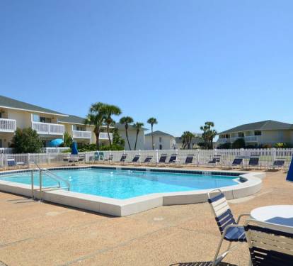 One of five sparkling community pools at Sandpiper Cove Resort, offering a refreshing place to cool off, relax poolside, and enjoy sunny Destin days in a peaceful resort setting.