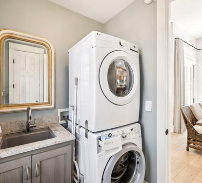 1st Floor Half Bath + Laundry Room - Conveniently Located Off the Kitchen