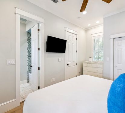 King Guest Suite - Balcony Access + Flat-Screen TV