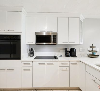 Fully Equipped Kitchen Offering Stainless Steel Appliances